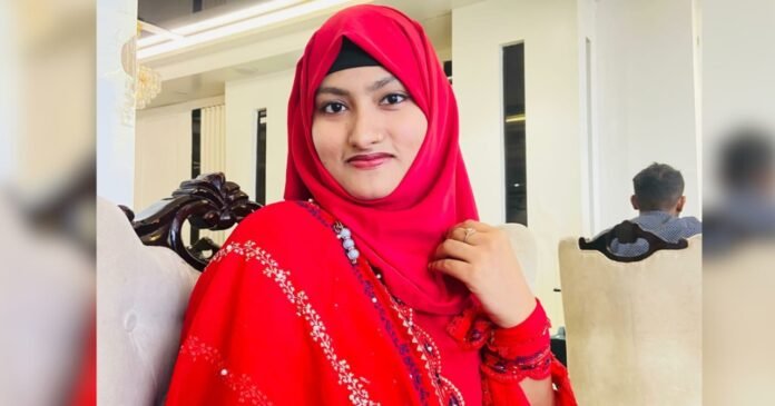 Nusrat Jahan Lopa, a student of Jahangirnagar University, holding her gold medal and national award from the International Astronomy and Astrophysics Competition (IAAC).