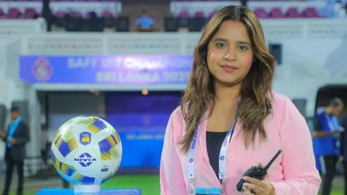 bangladesh-first-female-match-commissioner-suboha-rahman Suboha Rahman, Bangladesh's first female AFC match commissioner, smiling confidently on a football pitch in a professional blazer.