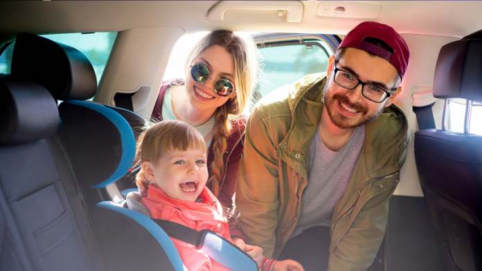 Parents traveling with their child in nature, showing curiosity, bonding, and learning through travel